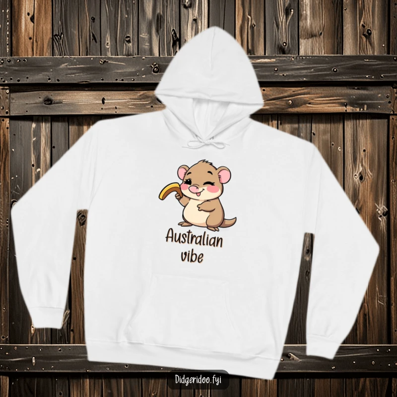 Funny platypus hoodie, winking and holding a small boomerang, offering warmth and a dose of quirky Australian adventure humor.