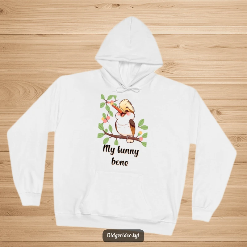 Funny Kookaburra Hoodie: a jubilant bird laughs heartily from a eucalyptus branch, offering cozy comfort and contagious humor.