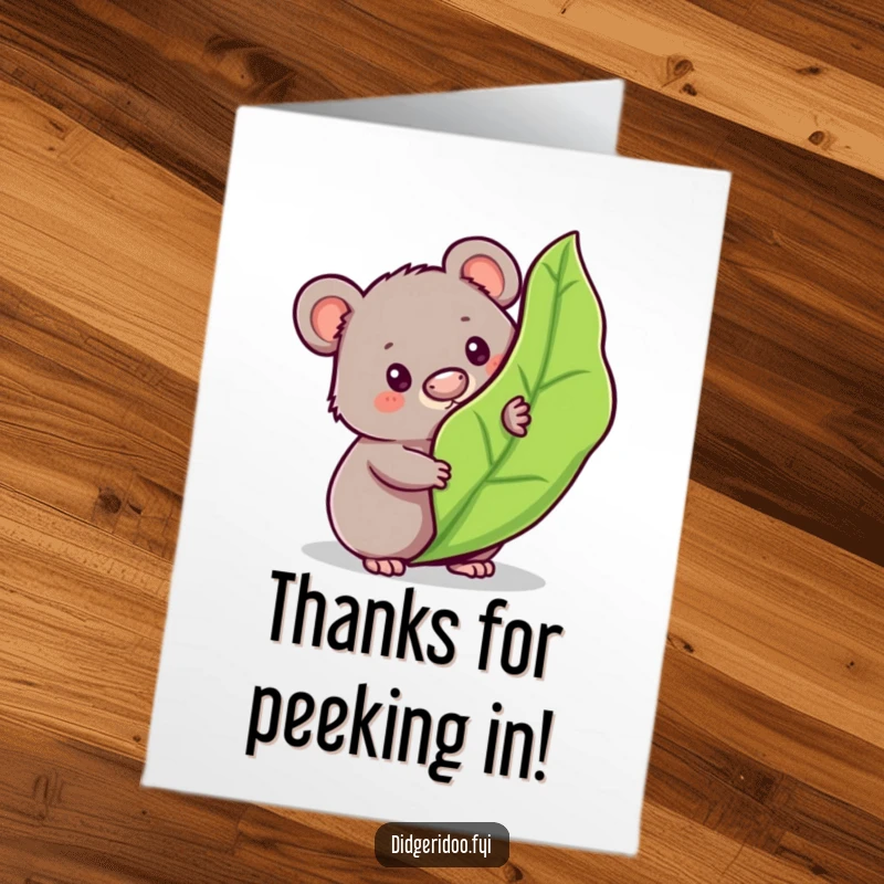 Funny Free Printable Thank You Card: a curious wombat peeking from behind a bouncy gum leaf, with thanks.