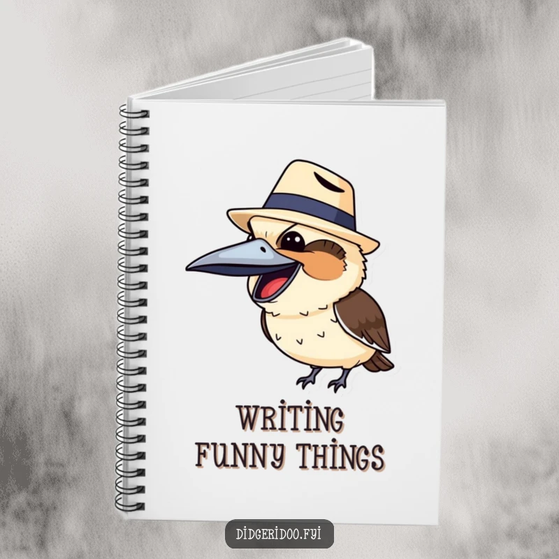 Funny kookaburra in a tiny Akubra hat, humorously writing in a notebook, ready to capture your brilliant ideas.