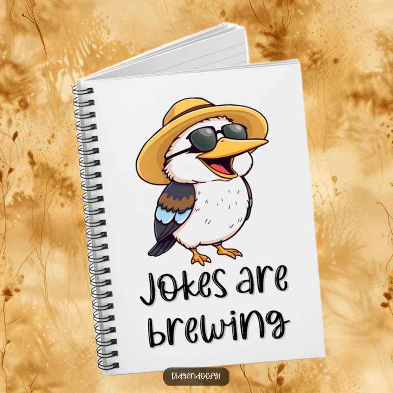 Funny Notebook featuring a cheerful kookaburra wearing a sun hat, laughing heartily.