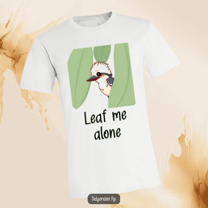 Funny kookaburra t-shirt, curious bird peeking from eucalyptus leaf, hilarious nature tee, unique bird lover gift.