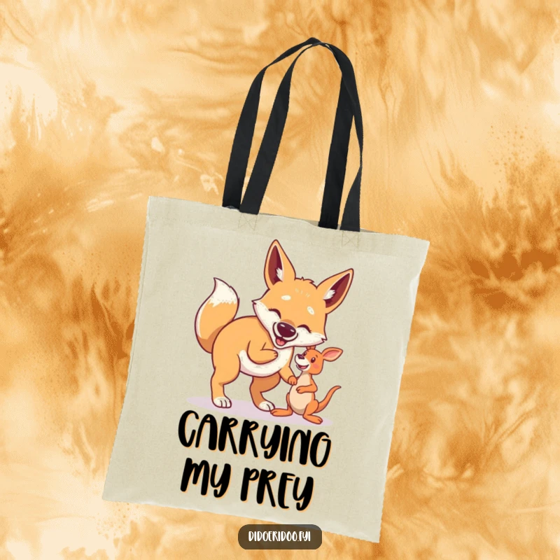 Funny Dingo Tote Bag: A proud dingo is shown playing fetch with a small kangaroo toy, a picture of playful determination.