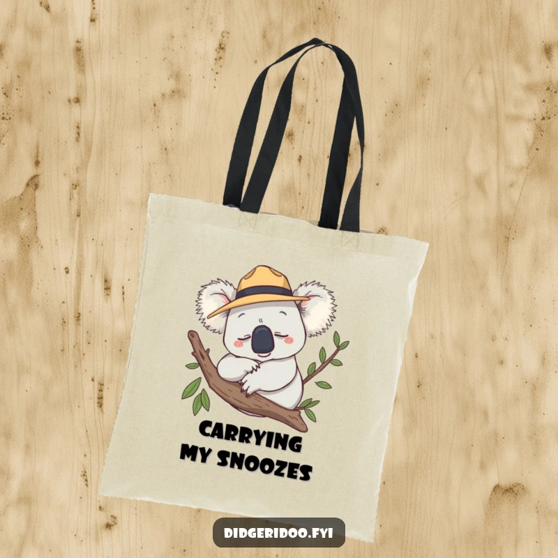 Funny Tote Bag with a smiling koala, Akubra hat, snoozing peacefully on a branch, for everyday use.