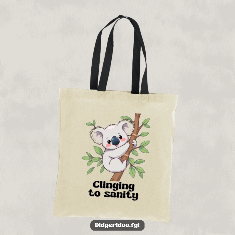 Funny Koala Tote Bag featuring a content koala peacefully holding onto a eucalyptus branch, for easy carrying.